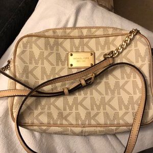 Michael Kors medium logo crossbody bag with matching wallet.